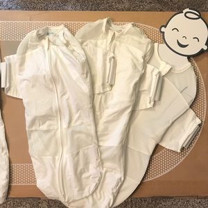 The Happiest Baby Snoo sleep sacks (3) and sheet